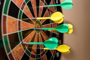 Close up of magnetic darts on dartboard